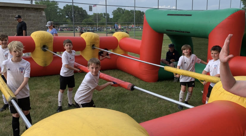 https://bloomingtonunited.org/wp-content/uploads/2024/05/Human-Foosball.jpeg