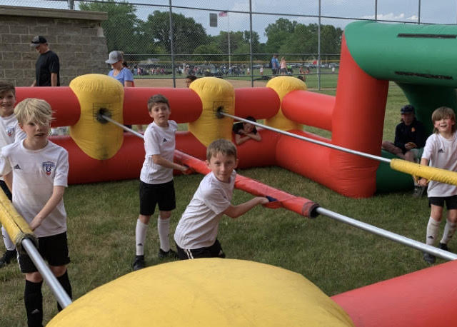 https://bloomingtonunited.org/wp-content/uploads/2025/01/Human-Foosball.jpeg